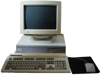 An A5000 - a square, squat box with a monitor on top, and a keyboard and mouse attached.