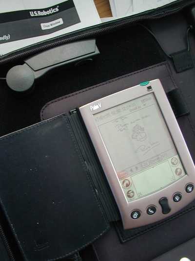 A close-up of the Palm device sitting in the Smartpad wallet