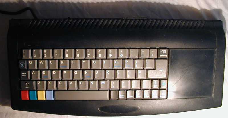 Surfboard keyboard - like a long regular keyboard with some special keys to the left.  And with a computer inside.