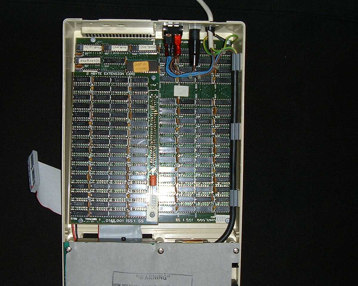With the lid off, it shows a whole motherboard of uniformly placed chips.