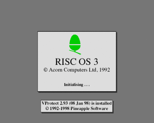 The RISC OS 3 splash screen - a grey box with the Acorn logo, and a copyright message from 1992.  There's also a message about anti-virus software being loaded.